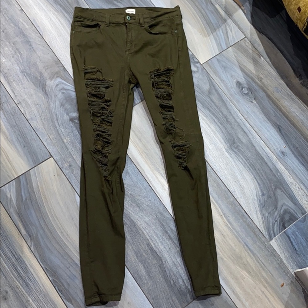 Olive green ripped jeans